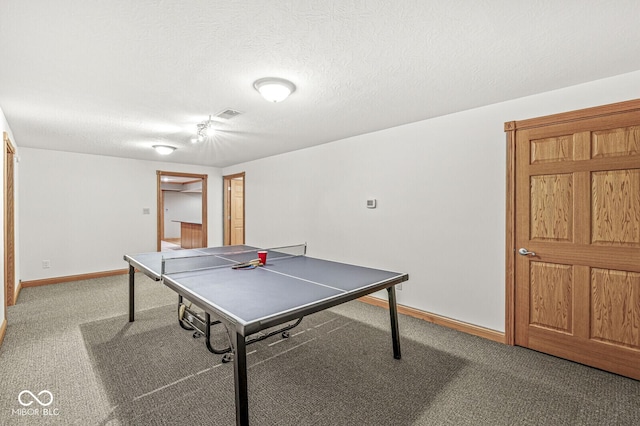 3766 Brill Rd, Indianapolis, IN 46227 - game room with carpet and a textured ceiling