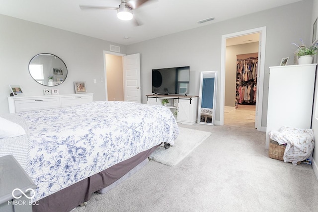9309 Kellner St, Pendleton, IN 46064 - bedroom with light carpet, a walk in closet, ceiling fan, and a closet