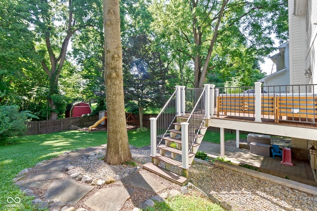 111 N 8th St, Zionsville, IN 46077 - view of yard featuring a patio, a playground, stairs, a wooden deck, and view of scattered trees