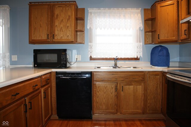 6052 N Deckshire Ln, Shirley, IN 47384 - kitchen with black appliances, open shelves, brown cabinets, and light countertops