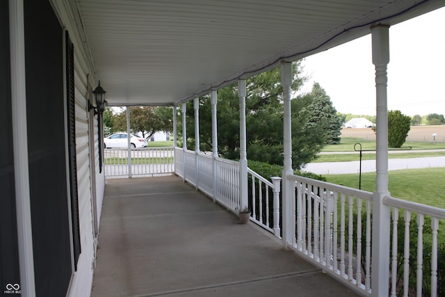 6052 N Deckshire Ln, Shirley, IN 47384 - covered porch featuring a lawn