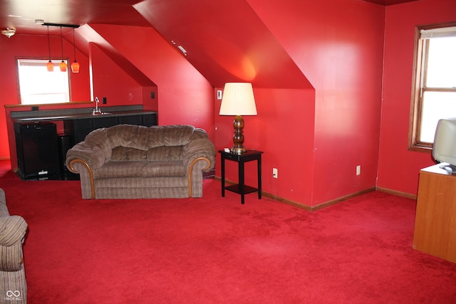 6052 N Deckshire Ln, Shirley, IN 47384 - home theater featuring carpet floors, vaulted ceiling, and bar area