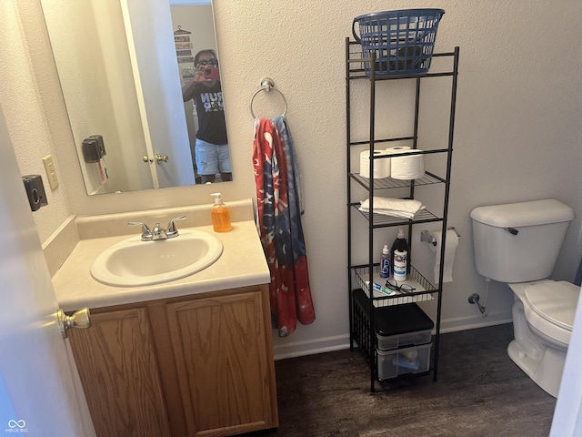 12536 Teacup Way NE, Indianapolis, IN 46235 - bathroom featuring vanity and wood finished floors