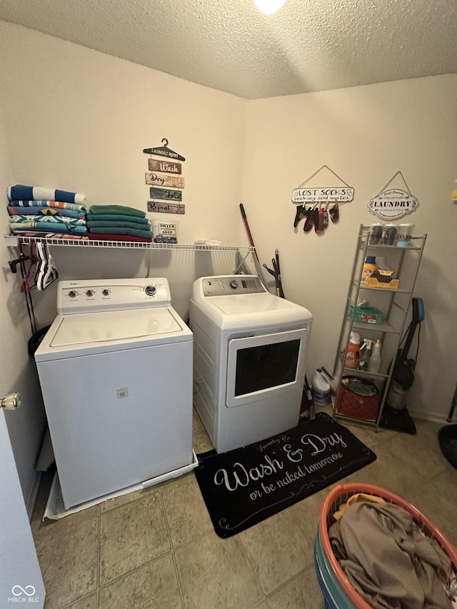 12536 Teacup Way NE, Indianapolis, IN 46235 - laundry room featuring independent washer and dryer and a textured ceiling