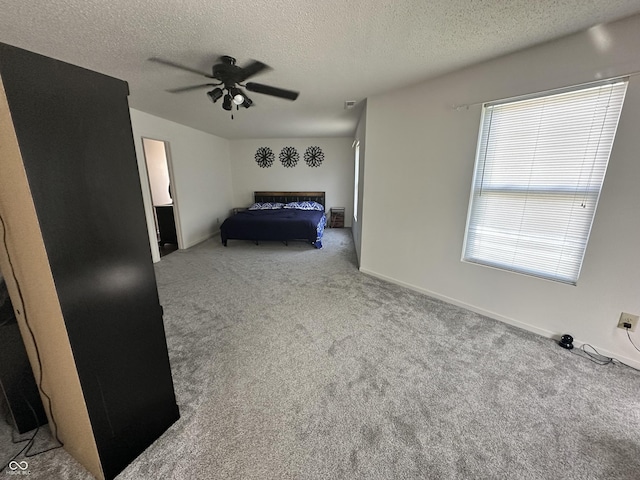 12536 Teacup Way NE, Indianapolis, IN 46235 - carpeted bedroom featuring a textured ceiling and ceiling fan