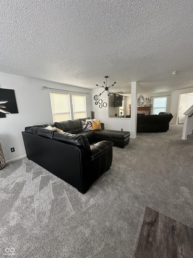 12536 Teacup Way NE, Indianapolis, IN 46235 - carpeted living room with a textured ceiling