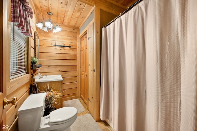 3715 Orchard Rd, Columbus, IN 47201 - full bathroom featuring wooden ceiling, wood walls, a shower with shower curtain, vanity, and wood finished floors