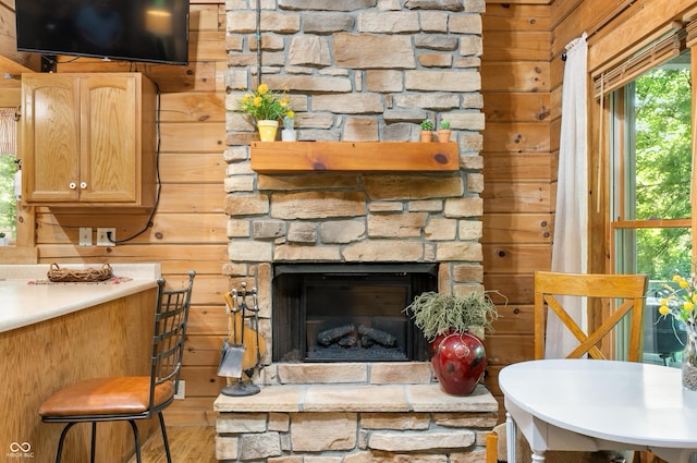 3715 Orchard Rd, Columbus, IN 47201 - living area with wood walls and a fireplace