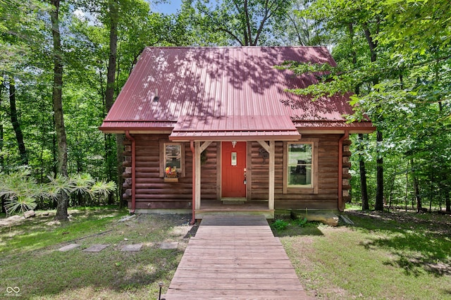 3715 Orchard Rd, Columbus, IN 47201 - log cabin featuring log exterior and a metal roof