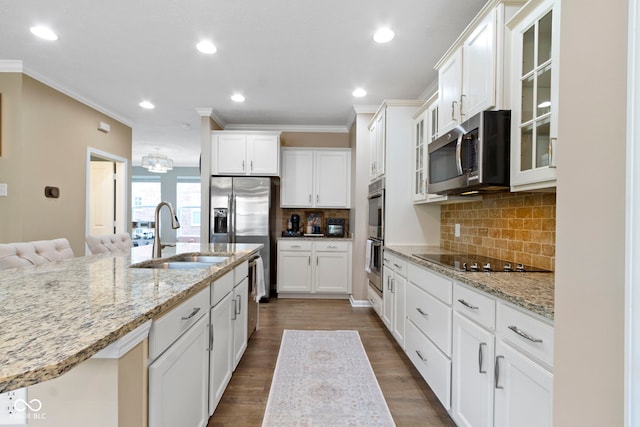 9476 Oakley Dr, Indianapolis, IN 46260 - kitchen with stainless steel appliances, crown molding, glass insert cabinets, white cabinets, and dark wood-style floors