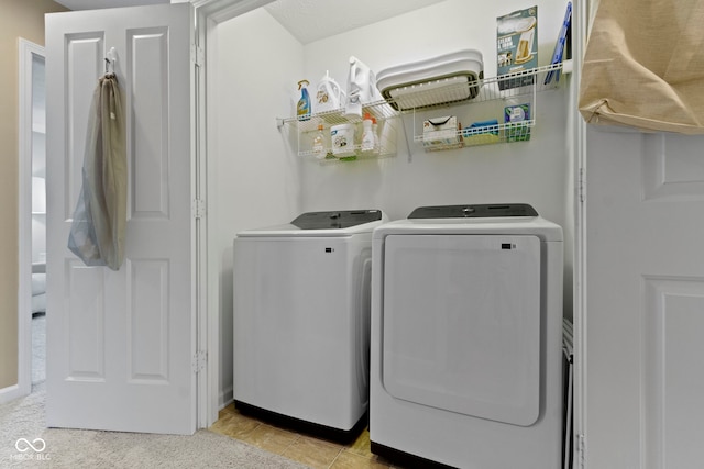 9476 Oakley Dr, Indianapolis, IN 46260 - washroom featuring independent washer and dryer and baseboards