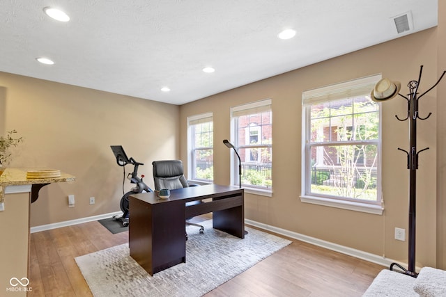 9476 Oakley Dr, Indianapolis, IN 46260 - office with light wood-type flooring and recessed lighting
