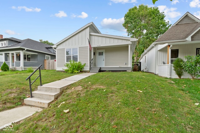 4129 Cornelius Ave, Indianapolis, IN 46208 - view of front facade with board and batten siding
