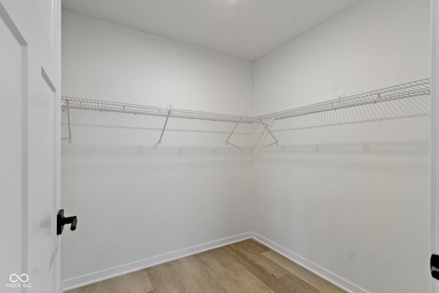 4129 Cornelius Ave, Indianapolis, IN 46208 - spacious closet with light wood finished floors
