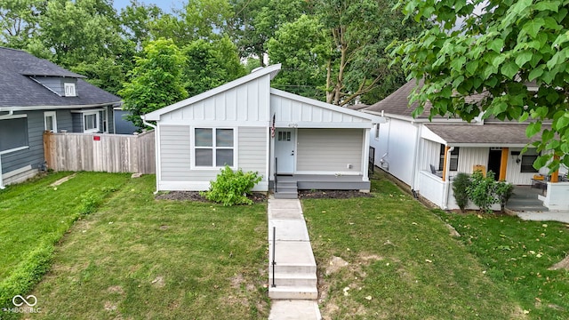 4129 Cornelius Ave, Indianapolis, IN 46208 - bungalow featuring board and batten siding and a porch
