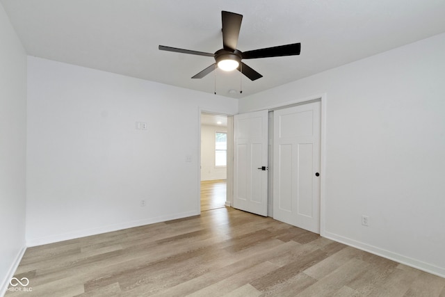 4129 Cornelius Ave, Indianapolis, IN 46208 - unfurnished bedroom with light wood-type flooring, a closet, and ceiling fan