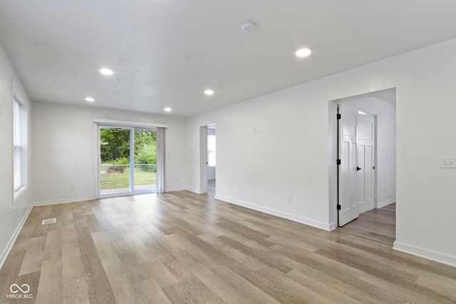 4129 Cornelius Ave, Indianapolis, IN 46208 - empty room with a smoke detector, light wood-style floors, and recessed lighting