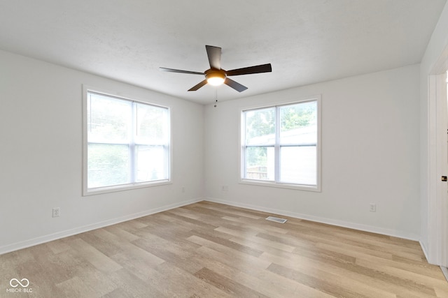 4129 Cornelius Ave, Indianapolis, IN 46208 - unfurnished room with light wood-style flooring and a ceiling fan