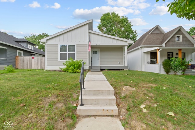 4129 Cornelius Ave, Indianapolis, IN 46208 - view of front facade featuring board and batten siding and a porch