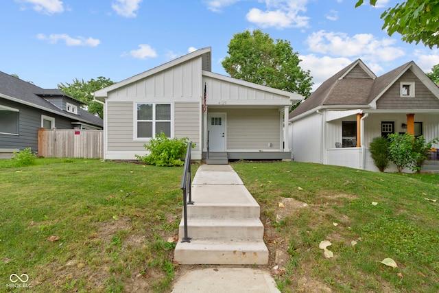 4129 Cornelius Ave, Indianapolis, IN 46208 - view of front of property featuring board and batten siding and covered porch