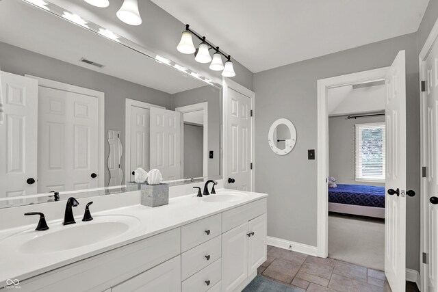 9690 Irishmans Run Ln, Zionsville, IN 46077 - full bathroom featuring double vanity and connected bathroom