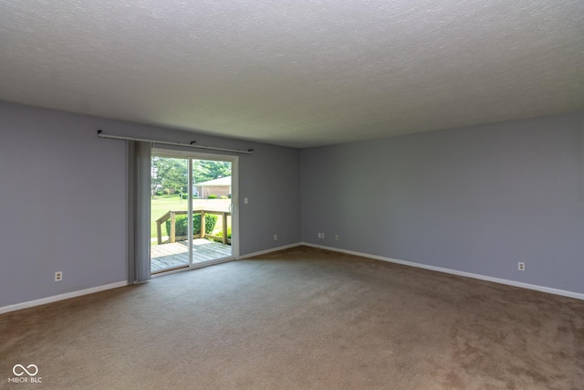 951 W Mckay Rd, Shelbyville, IN 46176 - carpeted spare room with a textured ceiling
