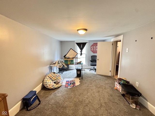 817 Pearl St, Covington, IN 47932 - rec room featuring carpet flooring and an office area