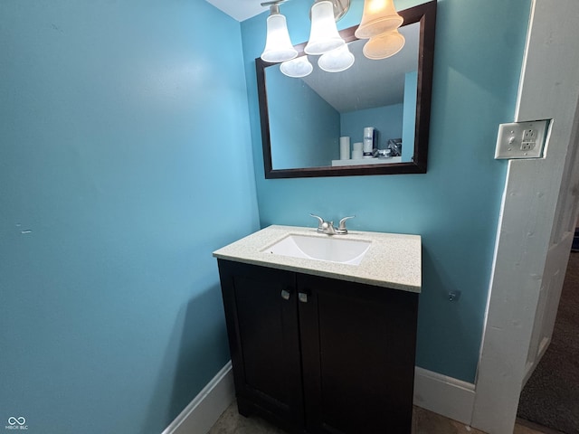 817 Pearl St, Covington, IN 47932 - bathroom featuring vanity and baseboards
