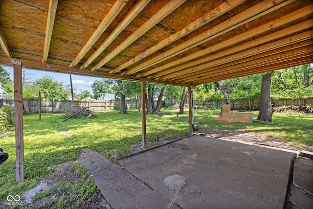 761 N Holmes Ave, Indianapolis, IN 46222 - fenced backyard with a patio area