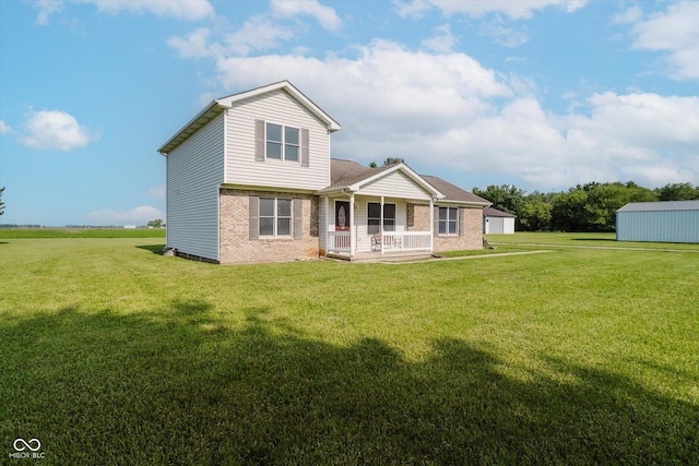 4330 S 100 E, Lebanon, IN 46052 - back of property featuring brick siding, a porch, and a lawn