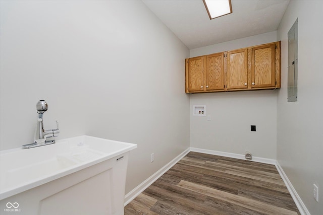 4330 S 100 E, Lebanon, IN 46052 - laundry room featuring washer hookup, wood finished floors, electric panel, cabinet space, and hookup for an electric dryer