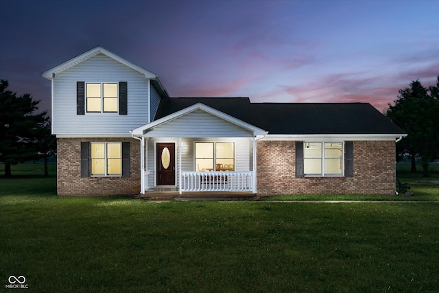 4330 S 100 E, Lebanon, IN 46052 - traditional-style home featuring brick siding, a porch, and a front lawn