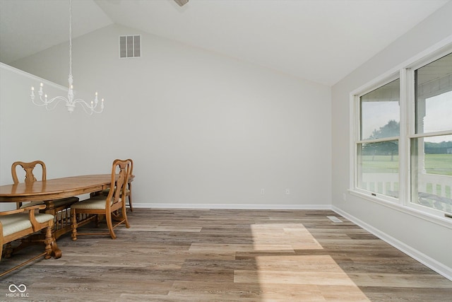 4330 S 100 E, Lebanon, IN 46052 - dining area with a chandelier, light wood-type flooring, and high vaulted ceiling