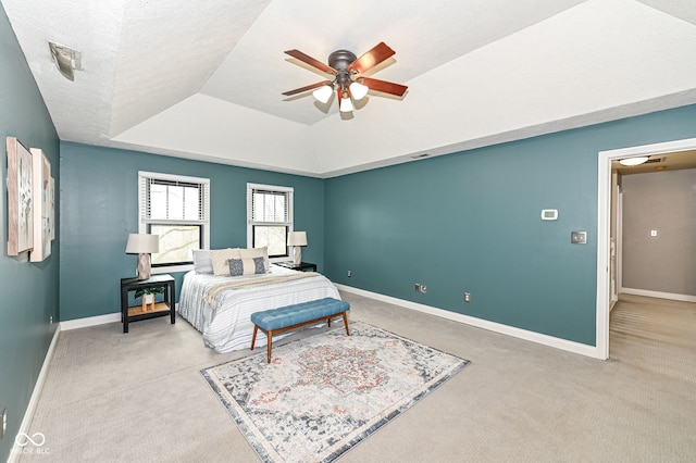 5826 Winding Way Ln, Indianapolis, IN 46220 - bedroom featuring a raised ceiling, light colored carpet, and ceiling fan