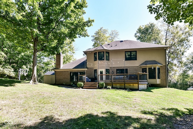 5826 Winding Way Ln, Indianapolis, IN 46220 - rear view of house featuring brick siding, a chimney, a yard, and a wooden deck