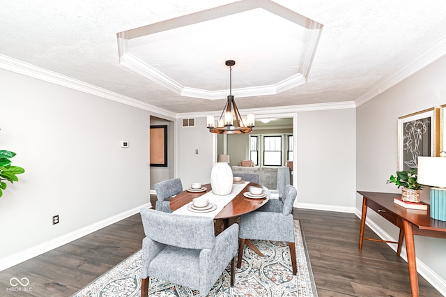 5826 Winding Way Ln, Indianapolis, IN 46220 - dining space featuring a chandelier, dark wood-style flooring, a raised ceiling, crown molding, and a textured ceiling