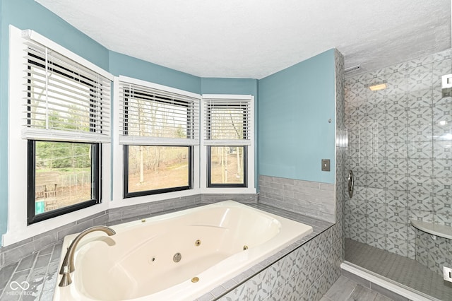 5826 Winding Way Ln, Indianapolis, IN 46220 - full bath with a jetted tub, a stall shower, and a textured ceiling
