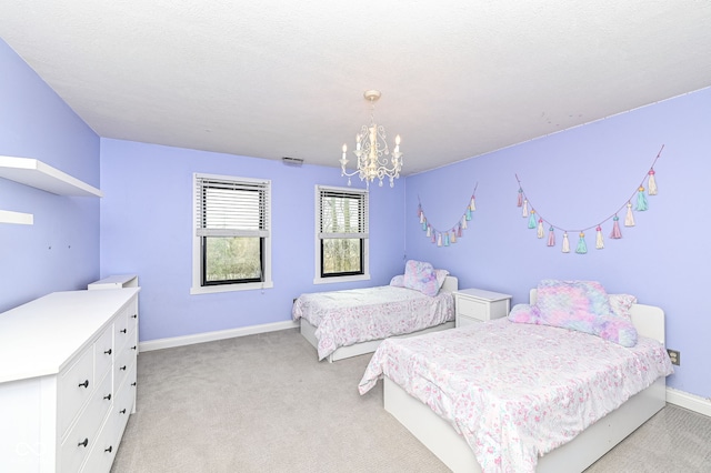 5826 Winding Way Ln, Indianapolis, IN 46220 - bedroom with light carpet and a chandelier