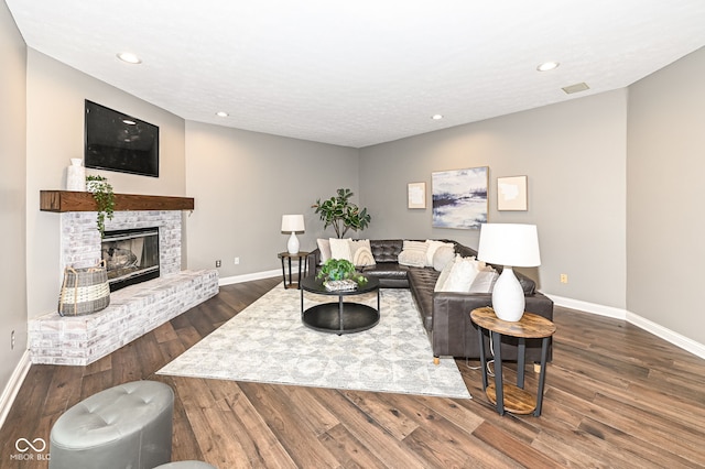 5826 Winding Way Ln, Indianapolis, IN 46220 - living area featuring wood finished floors, recessed lighting, and a brick fireplace