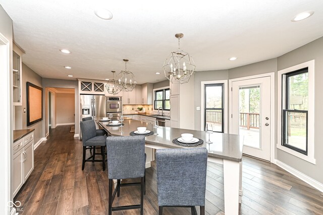 5826 Winding Way Ln, Indianapolis, IN 46220 - dining room with a chandelier, recessed lighting, and dark wood finished floors