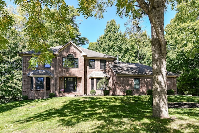 5826 Winding Way Ln, Indianapolis, IN 46220 - view of front of home with brick siding and a front lawn
