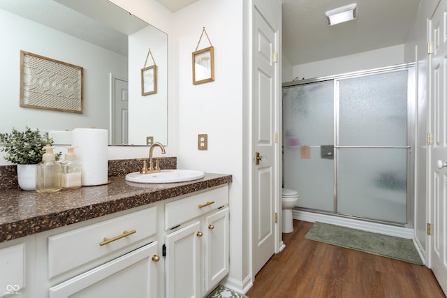 7612 Farm View Cir E, Indianapolis, IN 46256 - full bathroom featuring wood finished floors, vanity, and a shower stall