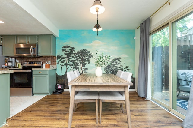 7612 Farm View Cir E, Indianapolis, IN 46256 - dining area featuring light wood-type flooring and recessed lighting