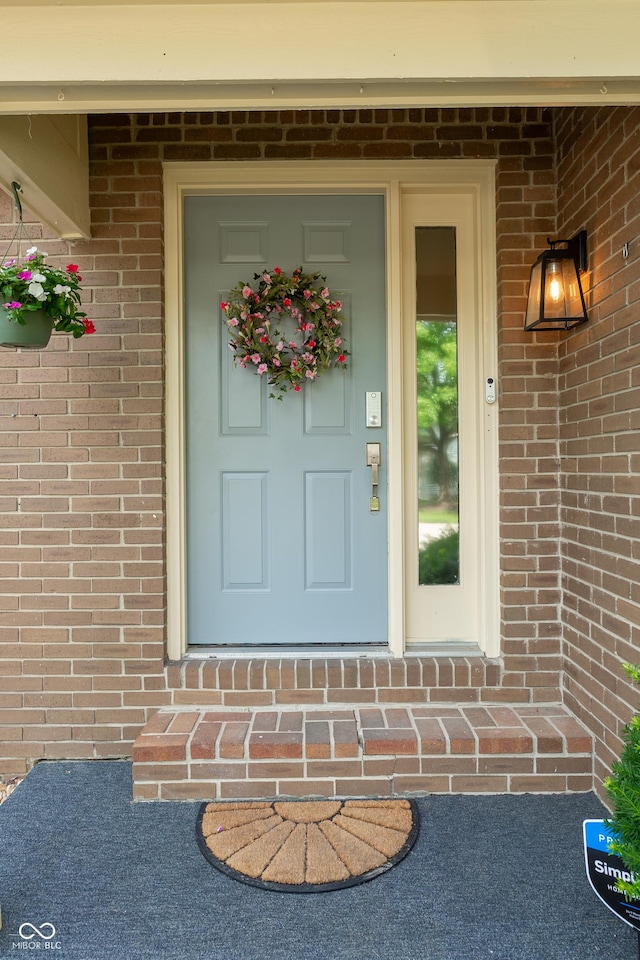 7612 Farm View Cir E, Indianapolis, IN 46256 - property entrance featuring brick siding