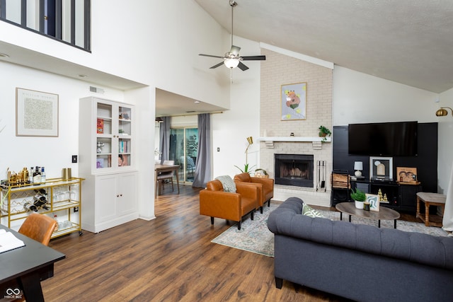 7612 Farm View Cir E, Indianapolis, IN 46256 - living area with wood finished floors, ceiling fan, a fireplace, and high vaulted ceiling