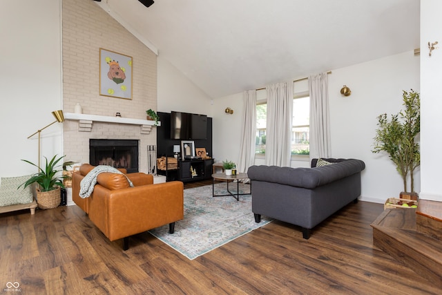7612 Farm View Cir E, Indianapolis, IN 46256 - living area featuring wood finished floors, a fireplace, high vaulted ceiling, and ceiling fan