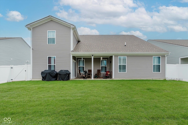 9806 Olympic Blvd, Pendleton, IN 46064 - back of house with a patio, a fenced backyard, a gate, and a shingled roof