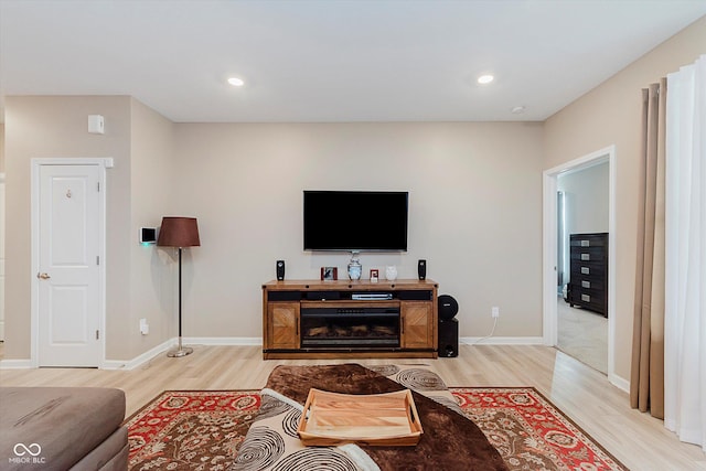 9806 Olympic Blvd, Pendleton, IN 46064 - living area featuring light wood-type flooring and recessed lighting