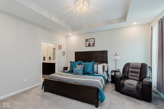 9806 Olympic Blvd, Pendleton, IN 46064 - bedroom with carpet floors, a chandelier, recessed lighting, ensuite bath, and a tray ceiling