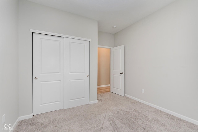 9806 Olympic Blvd, Pendleton, IN 46064 - unfurnished bedroom featuring carpet floors and a closet